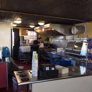 Inside at the counter to order