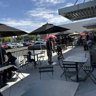 a lot of people waiting an hour plus for a free chicken sandwich, in 100 degree weather, moving so slow, many people are leaving the line