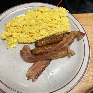 Scrambled eggs bacon and sausage