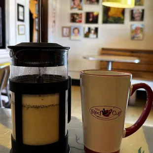 Quiet corner with a personal pot: Earl Grey Oat Milk Latte with Lavender Syrup
