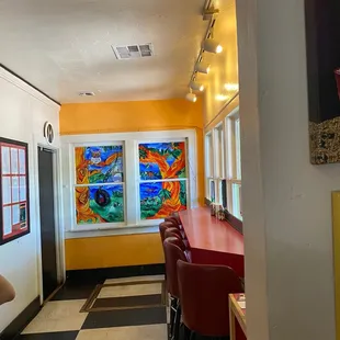 a woman sitting at a bar