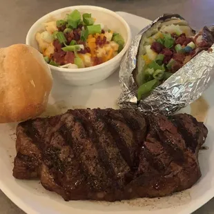 Ribeye , loaded baked potatoes and loaded Mac n cheese. Yummy!