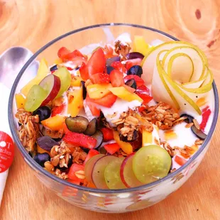 Parfait with creamy cheese crumbles, homemade yoghurt, fresh cream, rose water, 
 granola, variety of fresh fruit dusted with cinnamon sugar