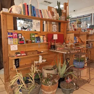 There is a collection of books to choose from while waiting for your food. They also have teas