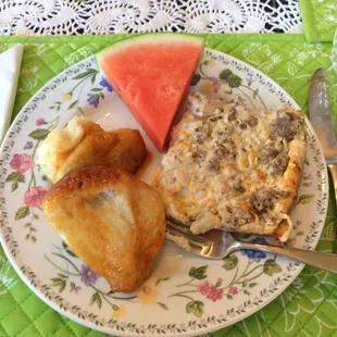 Amazing breakfast! Watermelon, sausage egg dish and homemade monkey bread!