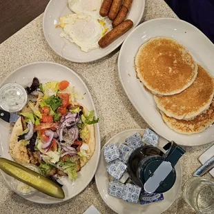 Pancakes, eggs and sausage - $21.45  Chicken gyro on pita - $12.95  July 2024