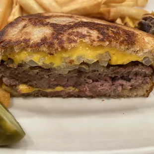 Classic patty melt:rye bread, burger,American cheese,grilled onions - so good. Eat it with A1 steak sauce not ketchup!
