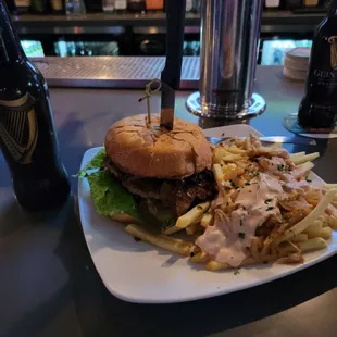 Red Fox Burger and Fox Fries with a Bottle of Guinness