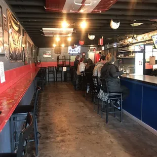 people sitting at the bar