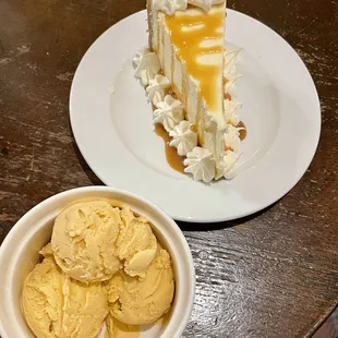 a slice of cheesecake and ice cream