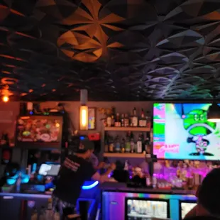 people sitting at a bar