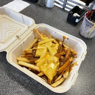 Gross chilli fries. They melted the cheese on the grill lmao. Separately