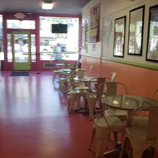 a restaurant with tables and chairs