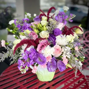 a vase of flowers on a table