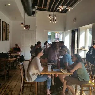 Grab a table, inside or outside, if you can find one.