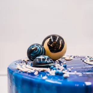 a close up of a blue cake