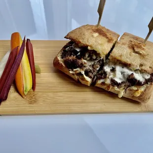 Red wine braised beef sandwich with Gruyère cheese, and horseradish mayo.