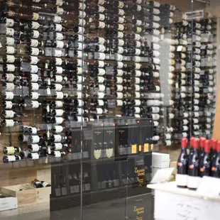 Peruse our temperature controlled wine cellar!