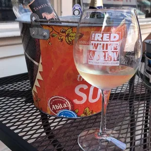 a glass of wine on a table