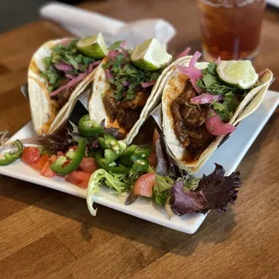 three tacos on a plate