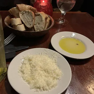 Free bread with oil and Parmesan cheese for dipping