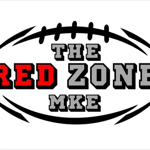 a football ball with the words the red zone mke