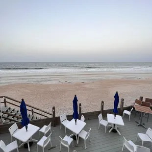 tables and umbrellas on the beach
