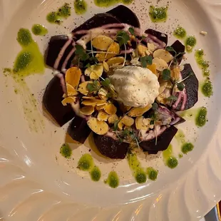 Beet Salad goat cheese canelé, almonds, champagne vinaigrette
