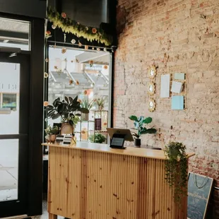 Our beautiful front desk. Brittany's dad custom built it for us!