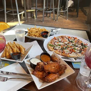 Top: Fries Left: Lumpia Right: Margherita Pizza Bottom: Raven Wings w/Ranch &amp; Stupid Hot Sauce Drinks: Sangria