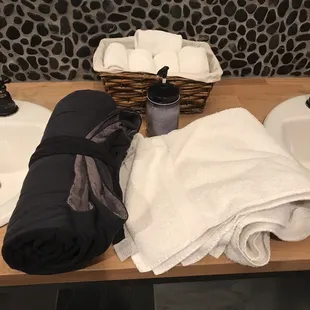 Robe, towel, sandals, and toiletries provided