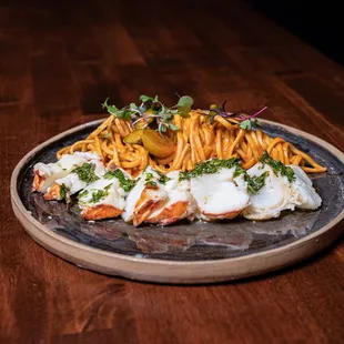 a plate of food on a wooden table