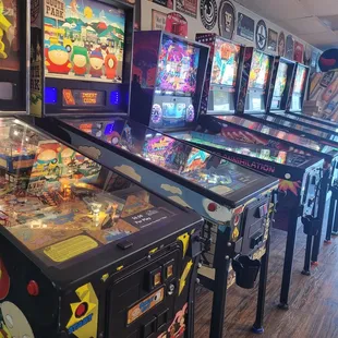 a row of pinball machines