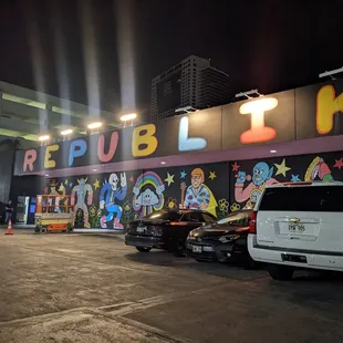 cars parked in front of a building