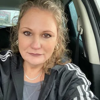 Sandi K.