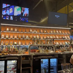 a bar with a lot of liquors