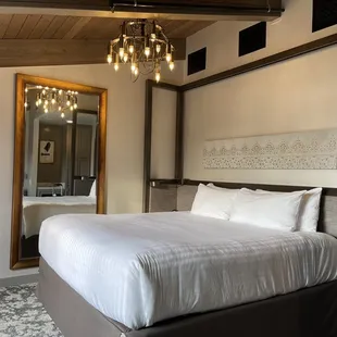 The Lux Chateau King room - bed view