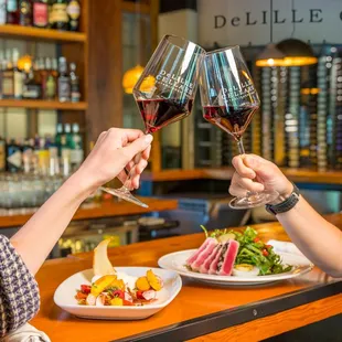 Enjoy a fine glass of wine paired with our delicious food menu items.