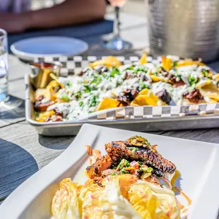 Harissa Grilled Octopus, Smoked Brisket Nachos