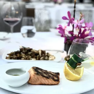 Organic king salmon and side of wild field mushrooms.