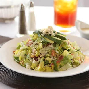 Blackened Chicken Cobb Salad tossed in our homemade creamy cilantro jalapeno ranch.