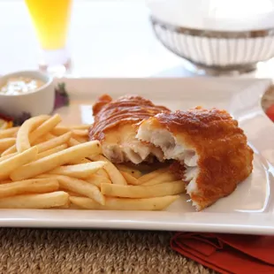 Fish and Chips. Fresh beer-battered Alaskan cod fillet, homemade coleslaw, french fries and tartar sauce.