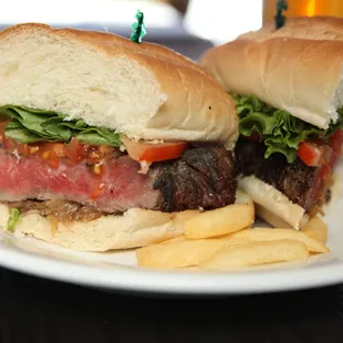 Angus New York Steak Sandwich grilled to your liking topped with crispy fried onions and chipotle mayo on a French baguette.