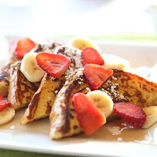 French Toast. Six slices of French Toast, dusted with Powered Sugar.