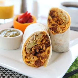 Chef's Special Burrito. Scrambled Eggs, Chorizo, Shredded Cheese, Fresh Salsa Verde and Hash Browns.