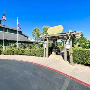 Tasting room to the left and restaurant entrance to the right.