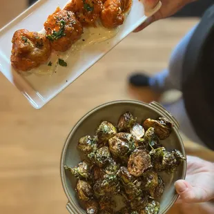 Staples on the menu: brussels bravas &amp; buffalo cauliflower
