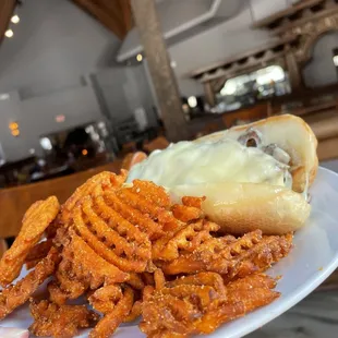 Philly cheesesteak with sweet potato fries