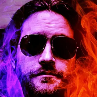 a man with sunglasses and a beard