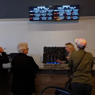 a group of people at a counter